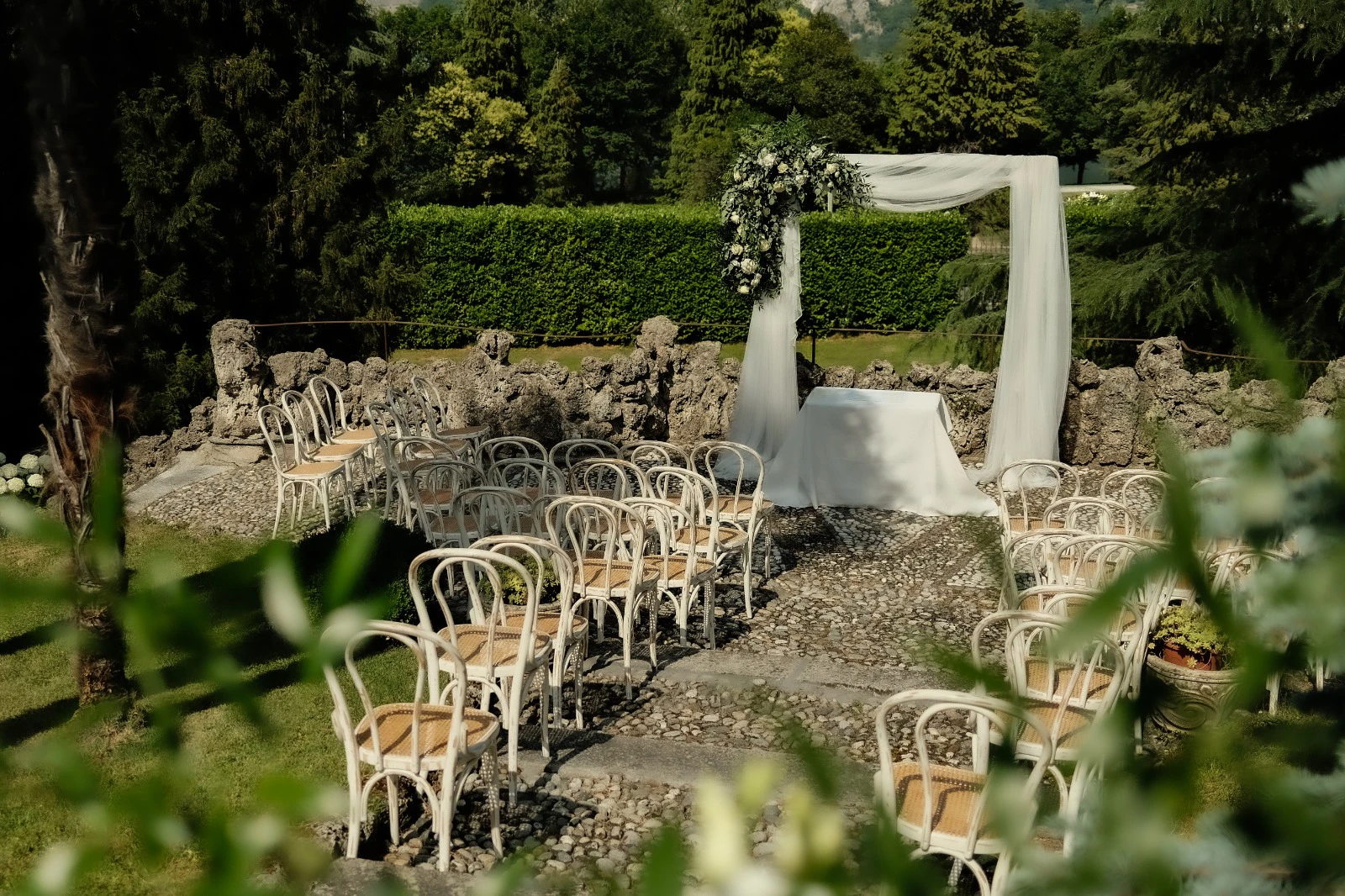 Outdoor wedding ceremony setup in the garden at Villa Wirnica near Lake Como. Outdoor wedding ceremony at Villa Wirnica near Lake Como